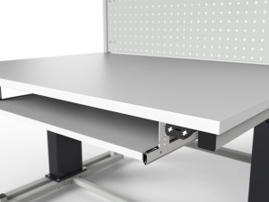 Electrically adjustable table with special shelf