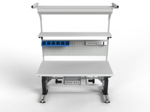 Electrically adjustable table with a tilting top