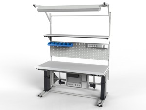 Electrically adjustable table with a tilting top