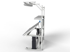 Electrically adjustable table with a tilting top