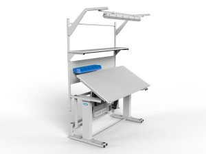 Electrically adjustable table with a tilting top